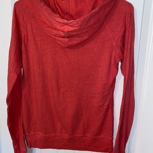 Pink colored Nike full zip hoodie